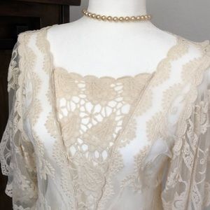 Tunic length sheer lace and crochet top